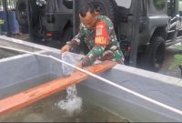 Mendukung Program Ketahanan Pangan Babinsa Koramil 02/SB Laksanakan Perawatan Budidaya Ikan Lele