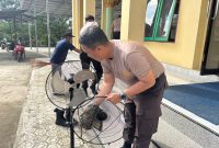 Ciptakan Lingkungan Sehat dan Harmonis, Polsek Muara Jawa Adakan Jum’at Bersih Bersama Warga