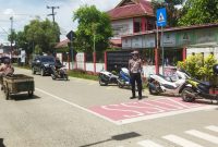 Satlantas Polres Kukar Berikan Rasa Aman bagi Pelajar di Zona Sekolah